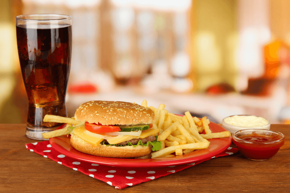 Examples of ultra-processed foods and natural food alternatives in a UK wellness lifestyle setting